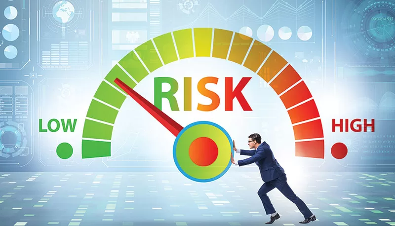 Businessman In Risk Metering And Management Concept